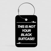 Black Suitcase - Tag