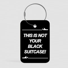 Black Suitcase - Tag