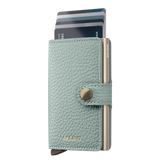 Secrid Miniwallet Pebble in Sea Green mit Schiebemechanismus und RFID-Schutz
