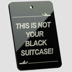 Black Suitcase - Tag