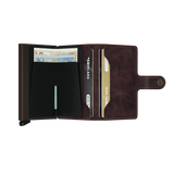 Geöffnetes Secrid Miniwallet Vintage in chocolate mit Platz für Kreditkarten und Geldscheinen